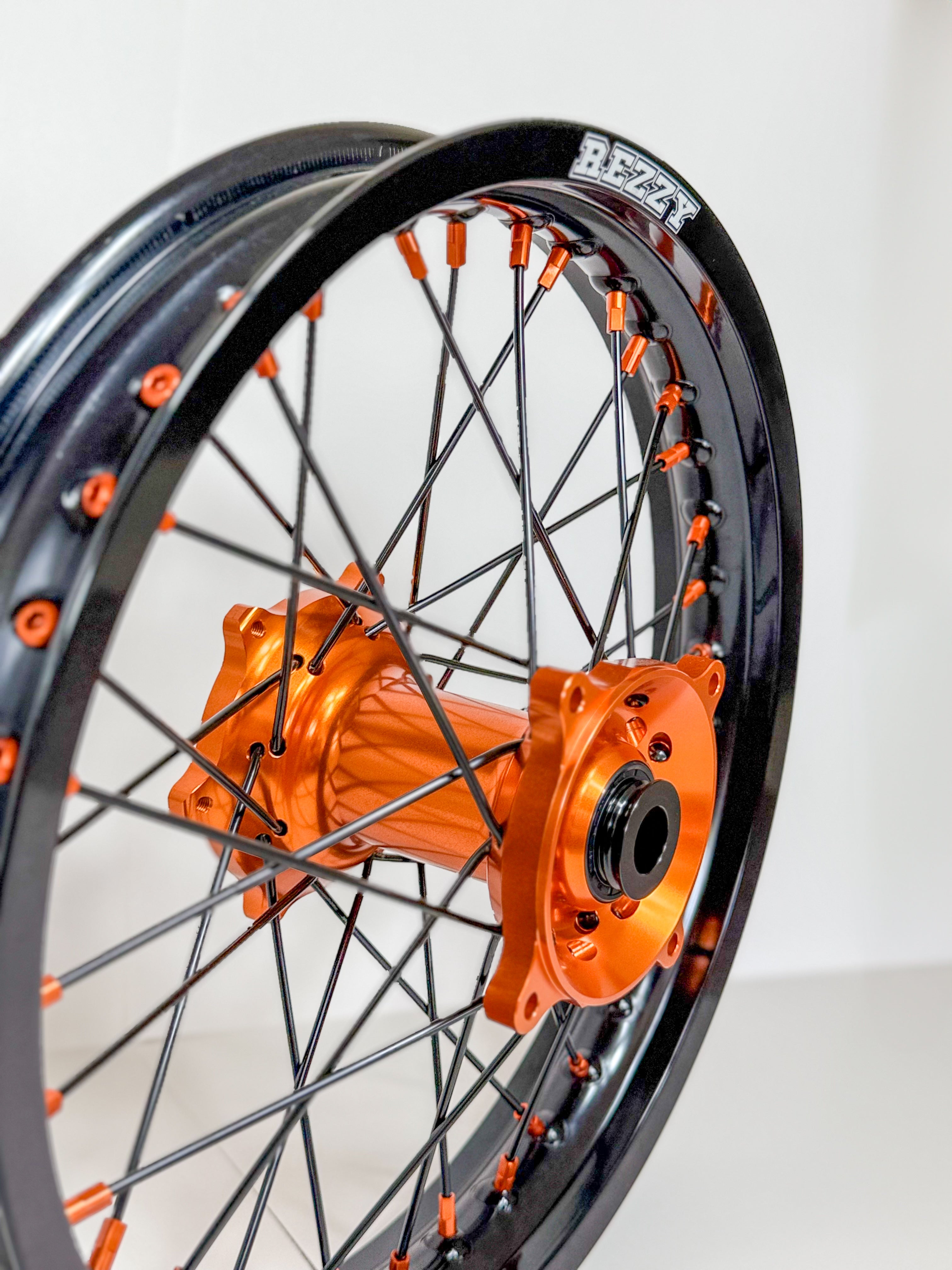 Rezzy Racing Wheel Set – Orange Hubs, Black Hubs and Orange Nipples 19x16